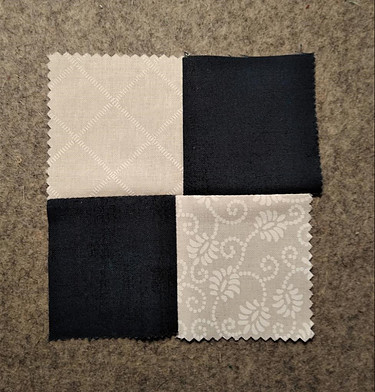 Fabric squares that are stretched and shifted creating an offset and undesired four patch block