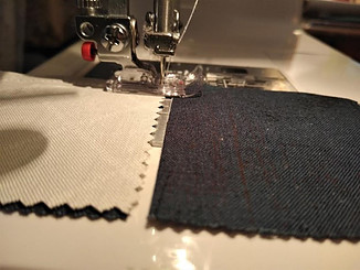 Feeding fabrics as one continuous string also known as chain piecing
