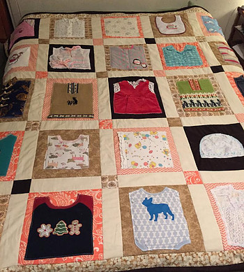 Quilt made from baby clothes