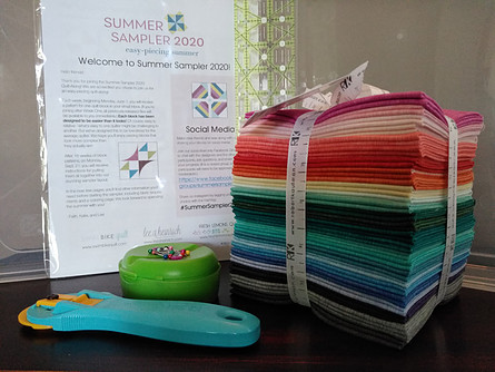 Welcome sheet, fabric and notions for summer sampler 2020 quilt top