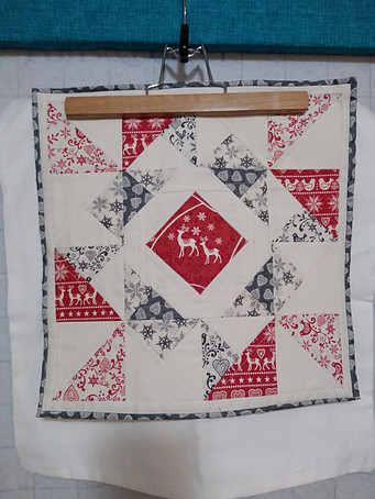 Quilt block made from the Scandi fabric line ready to be sewn onto ready-made zippered pillow case.