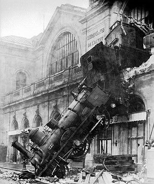 Steam engine derailed landing on street below