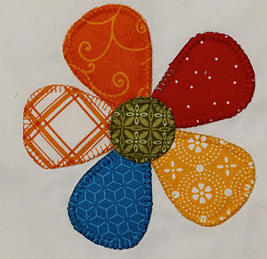 Fabric flower with zig-zag stitching