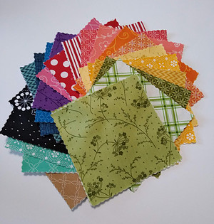 Multi colored fabric squares from Kimberbell Basics Spring charm pack