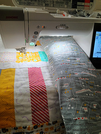 Free motion quilting - fabric: 'On The Go' by Stacy Hest Hsu.  Machine: Janome 9450.
