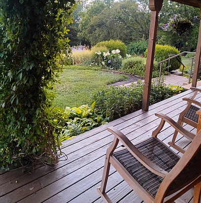 Rocking chairs on front porch at Cedar Crest Lodge - Pleasanton, KS