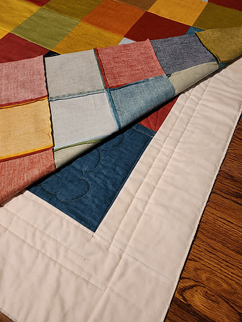 Basic patchwork panel used as a second backing on a quilt