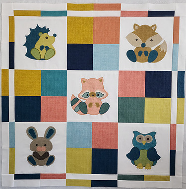 Woodland Critters quilt top using Laundry Basket Fabrics by Andover fabrics and Edyta Sitar