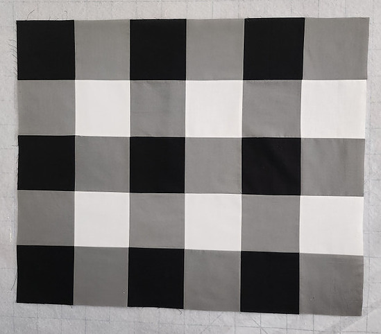 Black and white buffalo check quilt top