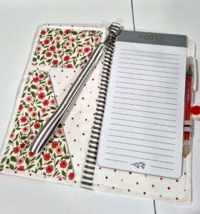 Fabric notepad cover with lined note pad and pen