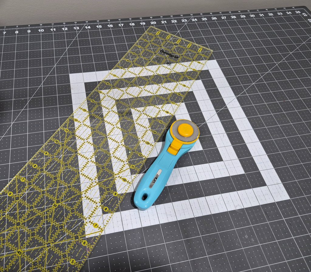 quilting tools: self-healing cutting mat, rotary cutter and 6x24 inch ruler